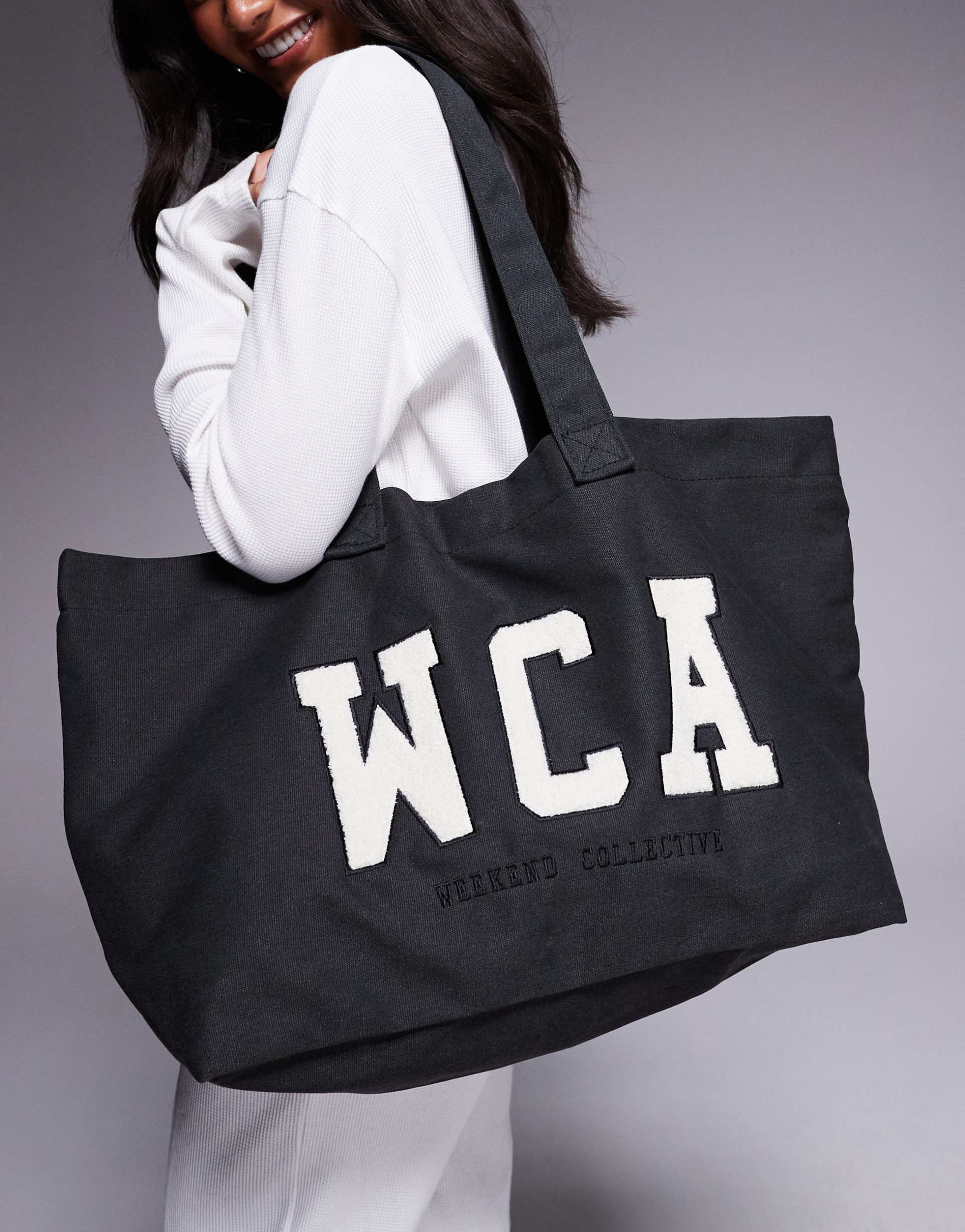 weekend collective tote bag with varsity graphic in washed charcoal