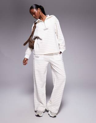 ASOS Weekend Collective Weekend Collective wide leg jogger in cream stripe with scribble graphic embroidery-White