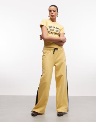 Asos Weekend Collective Weekend Collective Wide Leg Sweatpants With Contrast Stripe In Yellow