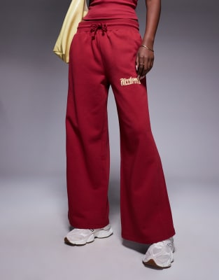 Asos Weekend Collective Weekend Collective Wide Leg Sweatpants With Mixed Font Graphic In Red