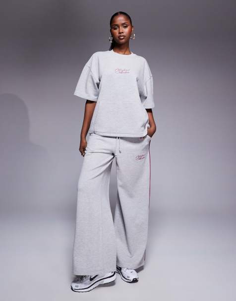 Weekend Collective wide leg sweatpants with piping detail in gray heather and plum - view 1