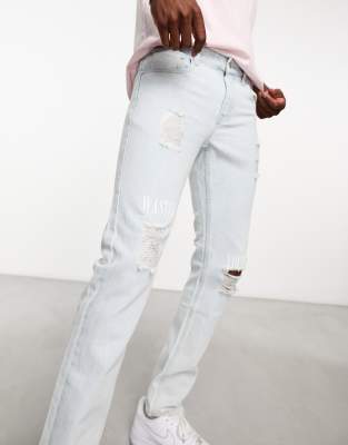 WESC Alessandro skinny jeans with rips in light blue