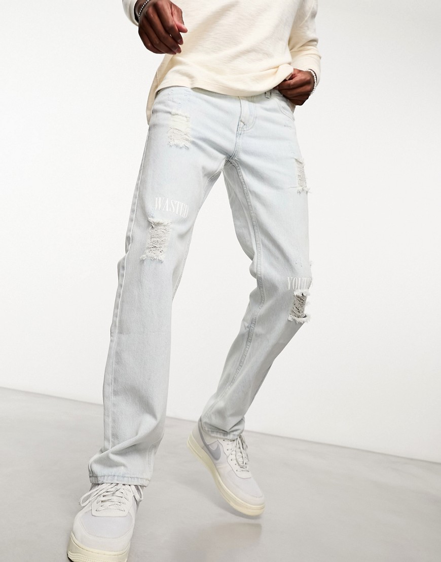 WESC Bob straight jeans with rips in light blue