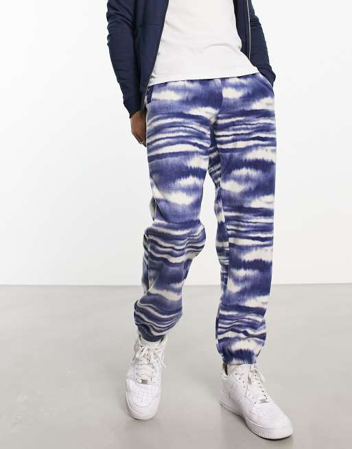 WESC polar fleece trackies in blue & white print