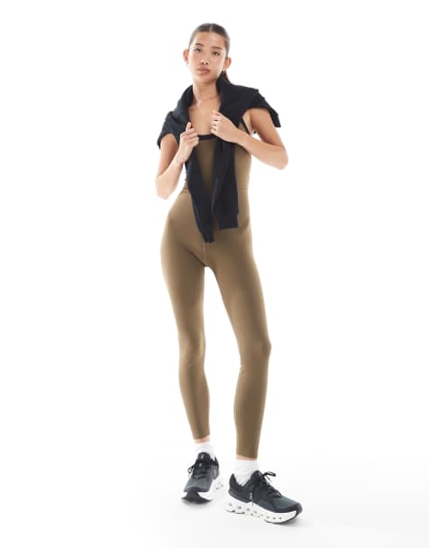 WeWoreWhat active contrast strap unitard jumpsuit in brown - view 1