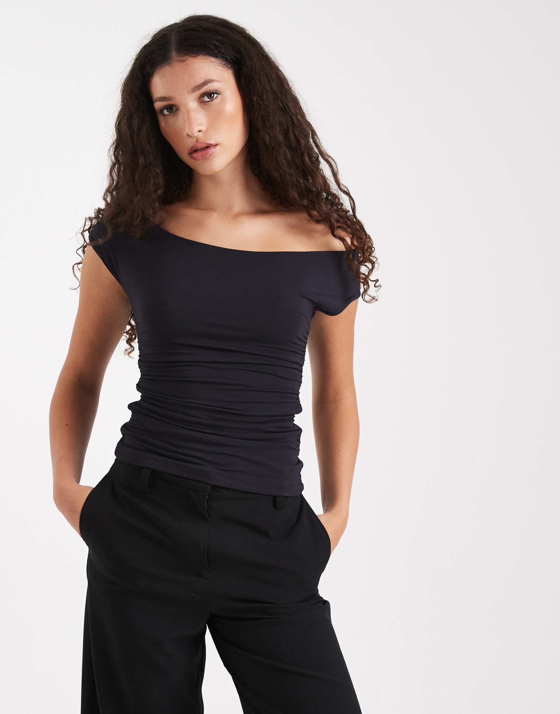 weworewhat asymmetric ruched off-shoulder crop top in black