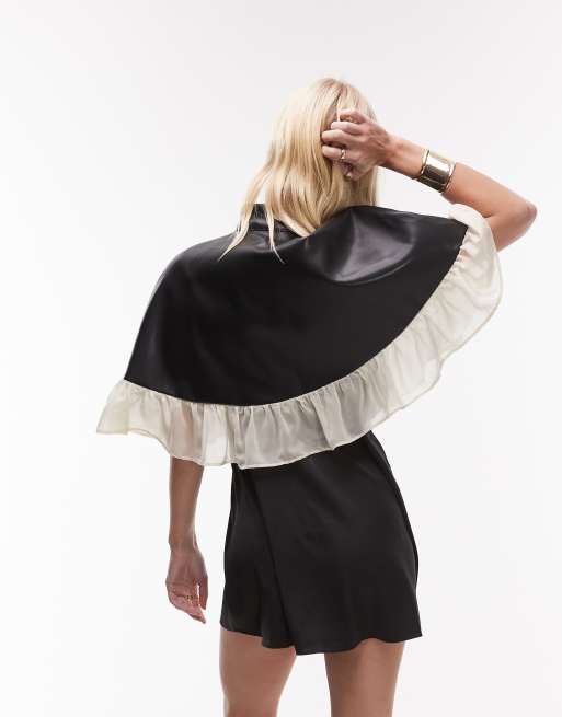 WeWoreWhat high neck button up cape in black and sand