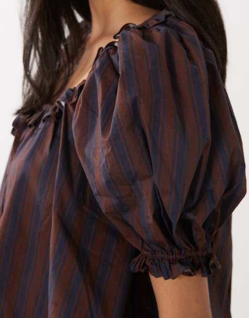 WeWoreWhat puff sleeve button up top in navy, 3 of 4