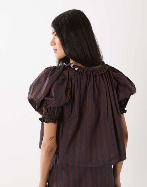 WeWoreWhat puff sleeve button up top in navy, 4 of 4