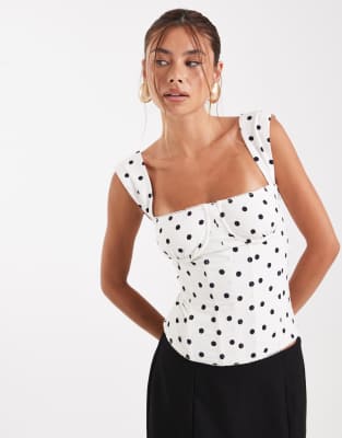 WeWoreWhat WeWoreWhat ruched cup corset top in black and white polka dot