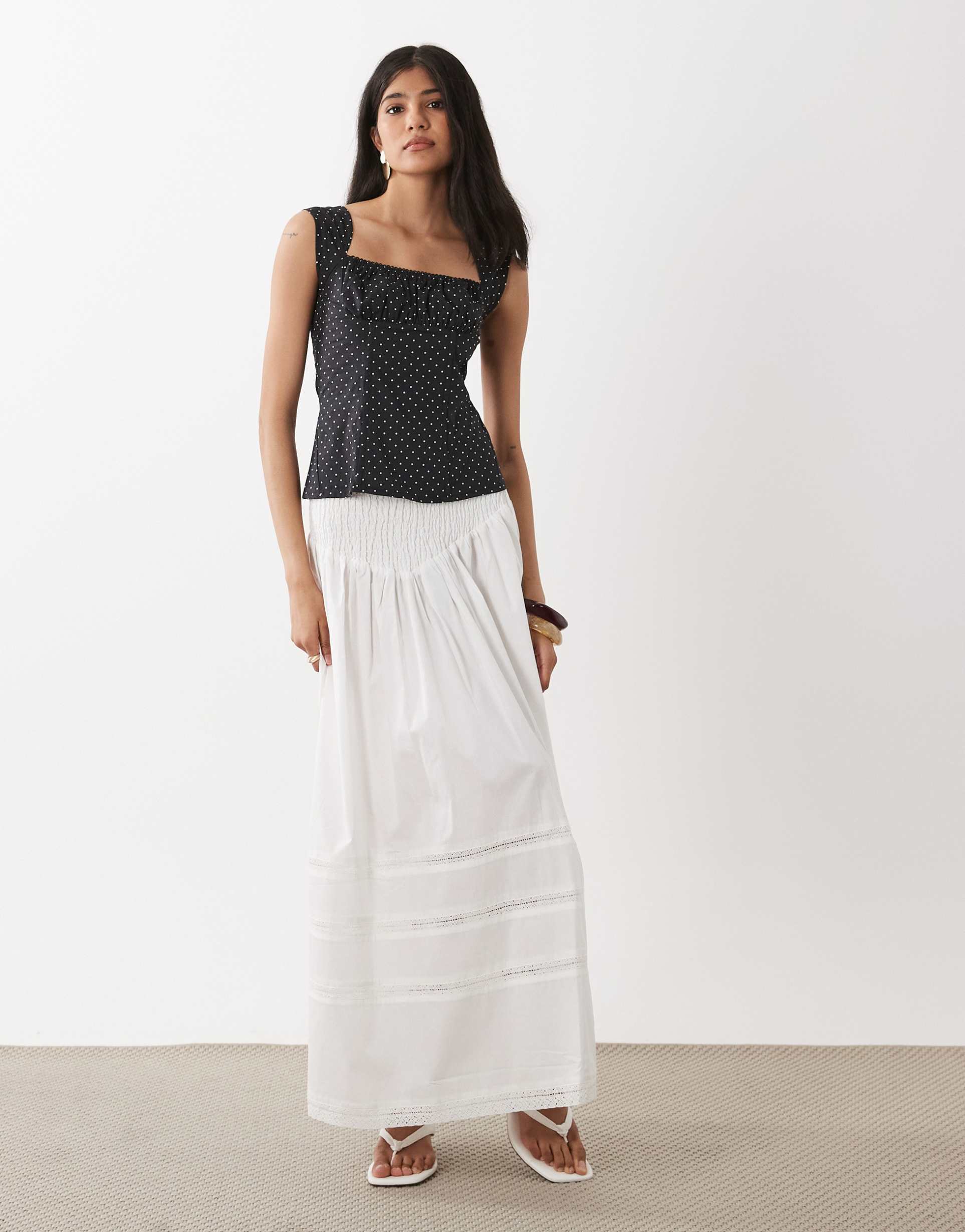 weworewhat smocked maxi skirt in white