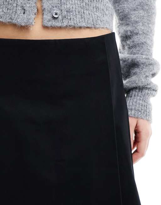 Whistles 90 s pleated mini skirt in black ASOS