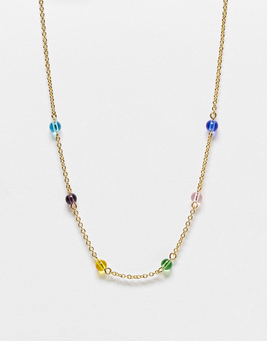 Whistles bead drop necklace in gold with mixed color beads