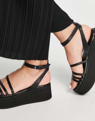 black strap flatforms