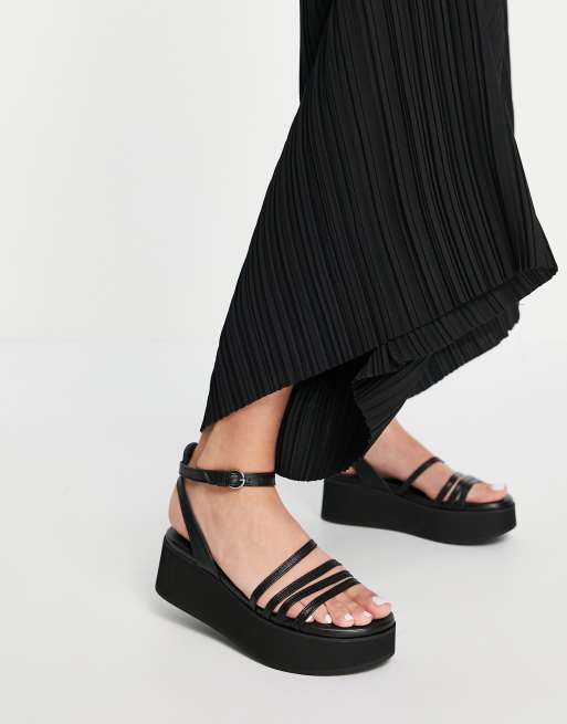 Black store strappy flatforms