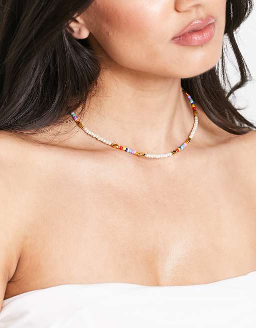 Whistles - Ketting met mini parels en bedeltjes