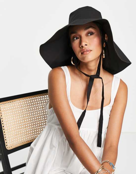 https://images.asos-media.com/products/whistles-oversized-sun-hat-with-straps-in-black/202212679-1-black?$n_550w$&wid=550&fit=constrain
