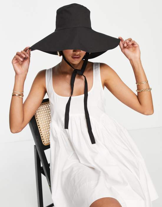 https://images.asos-media.com/products/whistles-oversized-sun-hat-with-straps-in-black/202212679-3?$n_550w$&wid=550&fit=constrain