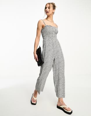 Naked Wardrobe sleeveless vinyl jumpsuit in black