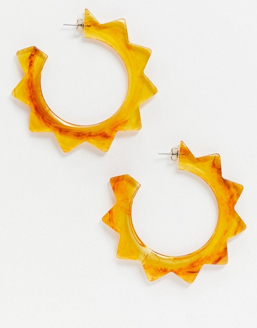 Whistles star burst resin earrings in orange