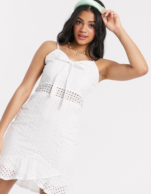 Wild Flower broderie anglais bow front mini dress with flippy hem in white