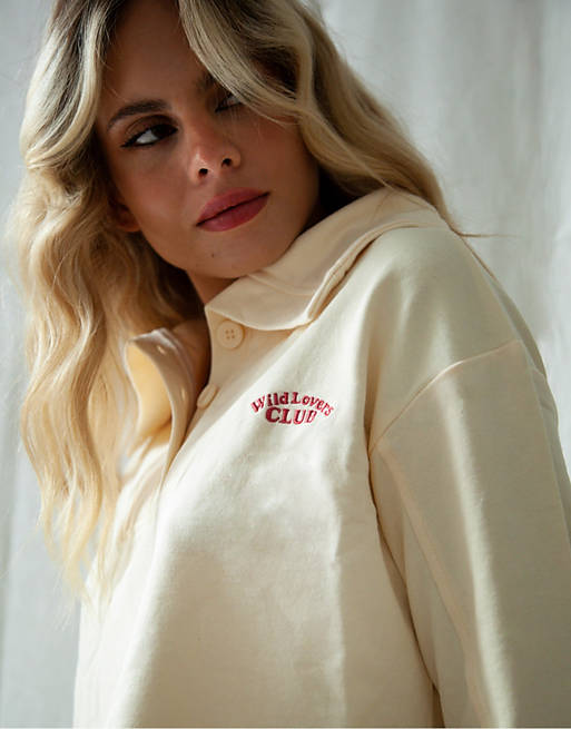  Wild Lovers Amsterdam organic cotton button front crop logo lounge sweat co-ord in cream 