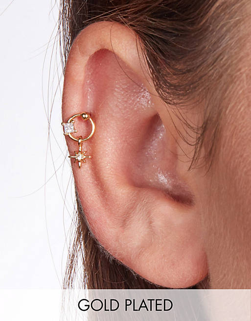 With Bling starburst drop piercing with 6mm titanium bar in gold plate