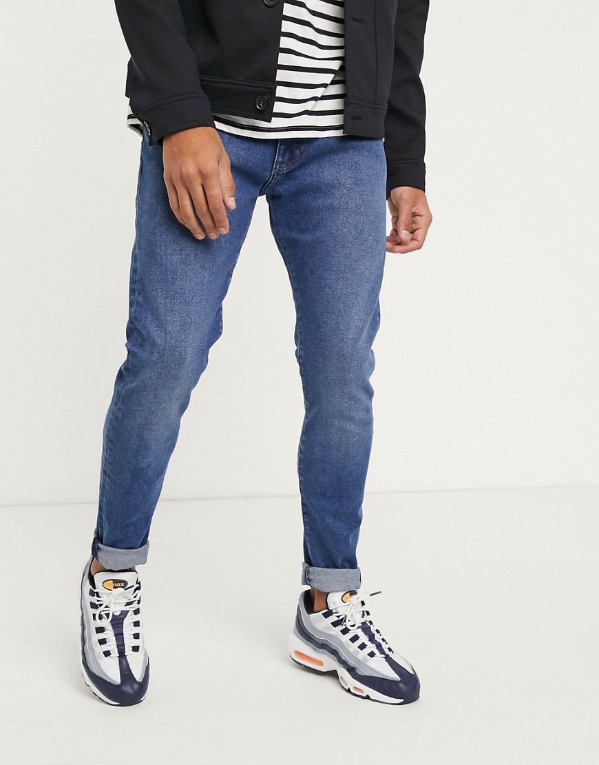 Wrangler - Bryson - Skinny jeans in middenblauw