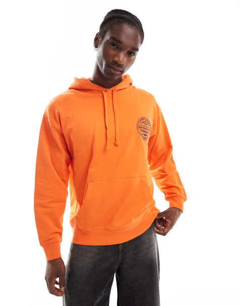 Wrangler – Casey Jones – Orange huvtröja i oversize med rund logga i vintagestil - view 1