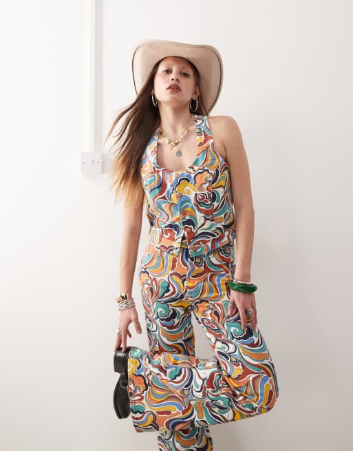 Wrangler - Crop top in denim con stampa anni '70 in colori vivaci in coordinato