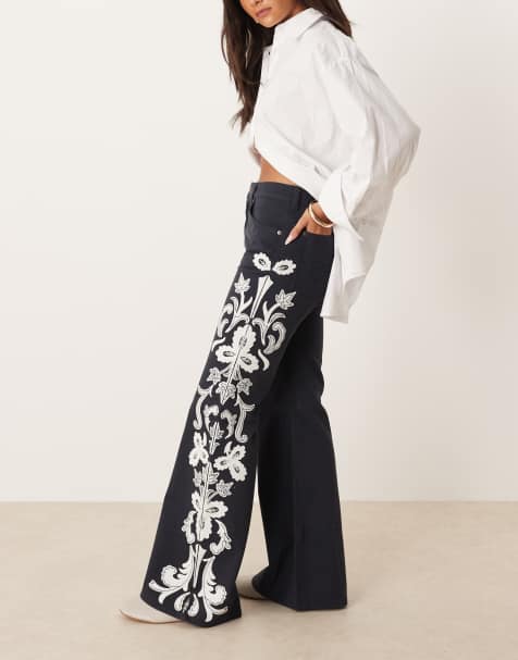 Wrangler 70s flare jeans with floral embriodery in black