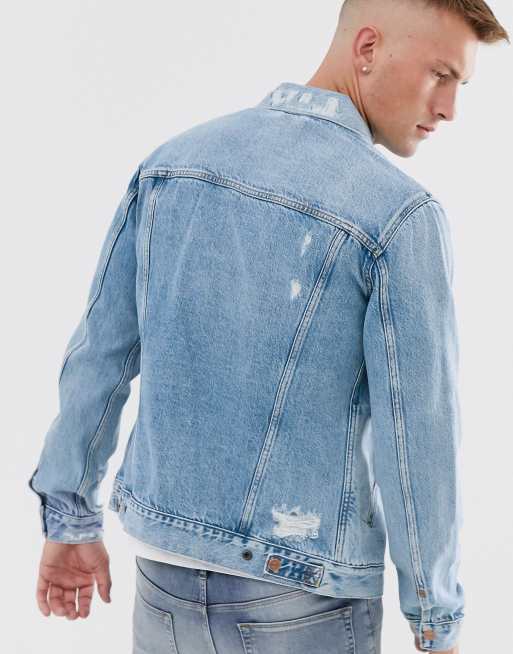 Distressed back denim store jacket