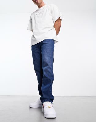 Wrangler Greensboro straight leg jean in mid blue - ASOS Price Checker