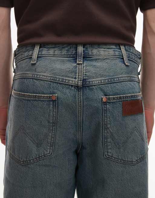 Wrangler – Jasnoniebieskie sprane jeansy o prostym luźnym kroju, 4 z 5