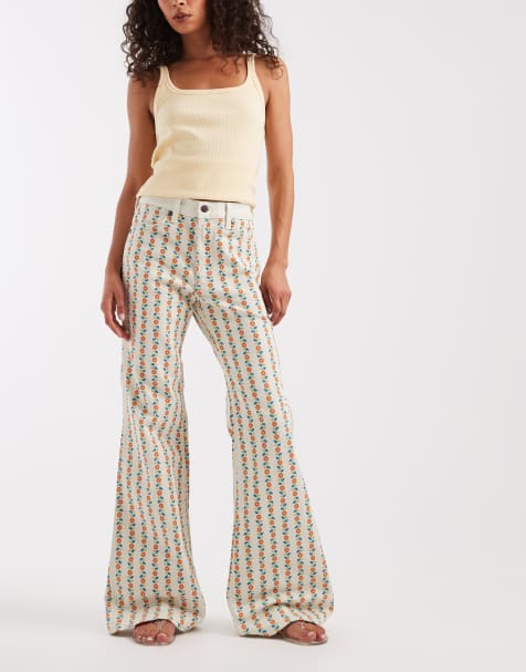 Wrangler - Jeans a zampa anni 70' a righe arancioni a fiori - view 1