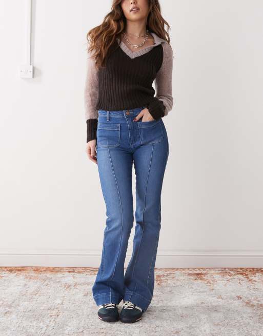 Wrangler - Jeans a zampa lavaggio vintage blu scuro con cuciture e tasche sul davanti