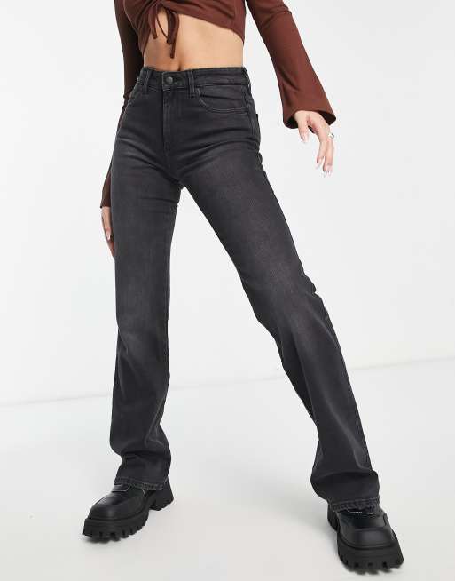 Wrangler - Jeans a zampa neri