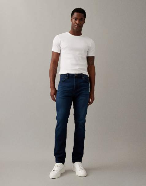 Wrangler Larston slim taper jean in midwash blue