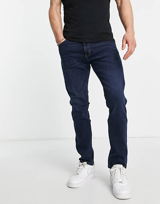 Wrangler Larston slim jeans in blue | ASOS