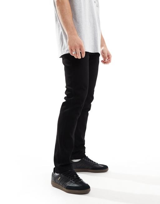 Wrangler Larston slim tapered fit jeans in washed black ASOS