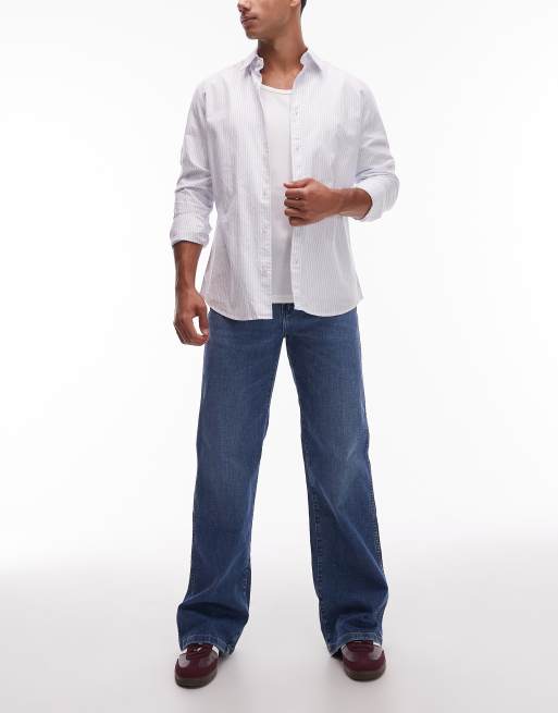 Wrangler loose bootcut jeans in mid wash blue