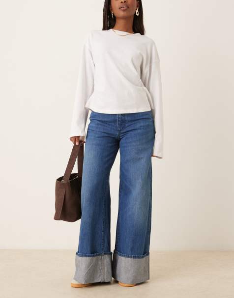 Wrangler – Mellanblå, tvättade jeans med vida ben och uppvikta kanter - view 1