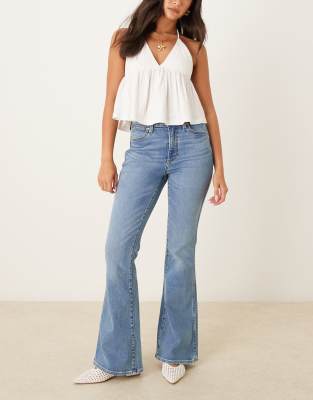 Wrangler - Montana - Schlagjeans in hellblauer Acid-Waschung