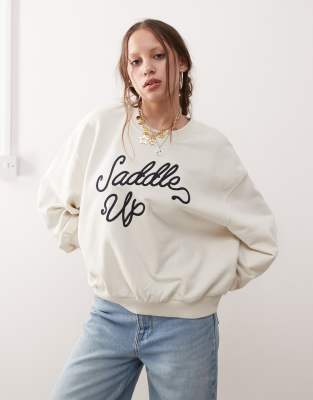 Wrangler - Oversize-Sweatshirt in Vintage-Weiß mit „Saddle Up"-Print