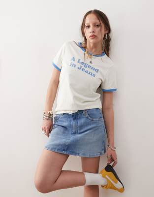 Wrangler - Ringer-T-Shirt in Vintage-Weiß und Blau mit Slogan