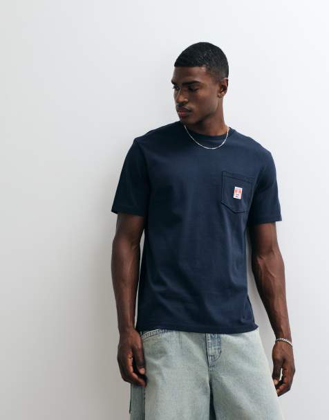 Wrangler – T-Shirt in Blau mit Brusttasche - view 1