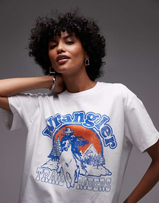Wrangler – T-shirt w kolorze złamanej bieli z nadrukiem kowboja na piersi