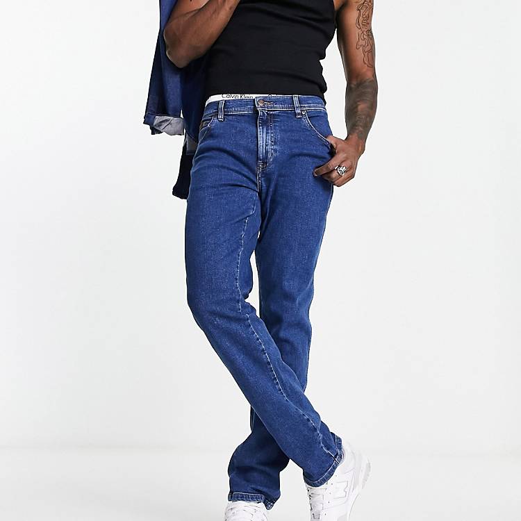 Wrangler Texas slim jeans in dark blue | ASOS