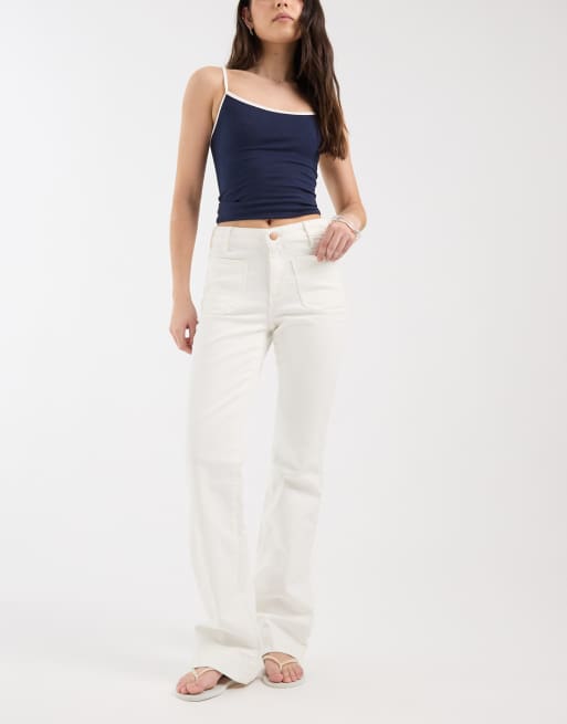 Wrangler - Vaqueros de campana color crudo con bolsillos delanteros