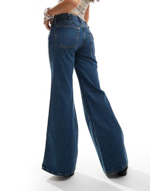 Wrangler Wanderer mid rise flared jeans in mid blue ASOS